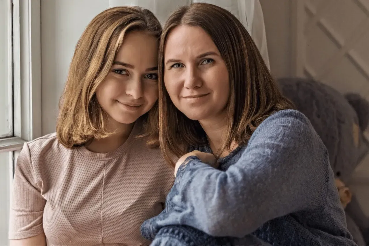 Parent and teen talking together